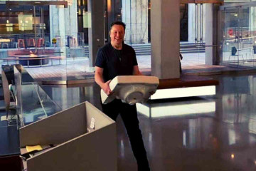 Chief Twit Elon Musk carries a sink to Twitter HQ as he takes control