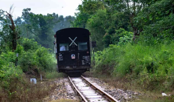 Why is the last coach of trains marked X ?