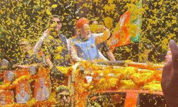 PM Modi kicks off a 26-km long roadshow in Bengaluru, greeted by thousands of people