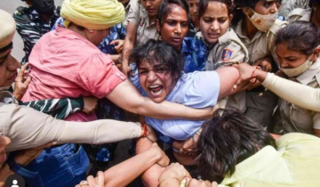 Following an altercation with Delhi police, wrestlers Malik, Phogat, and Punia charged with rioting