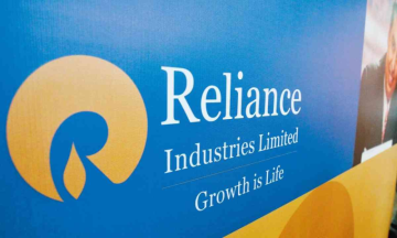 Reliance shares near all time high, ahead of inflation data
