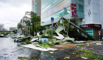 Typhoon Koinu brushes the southern tip of Taiwan, leaving 1 dead & many injured