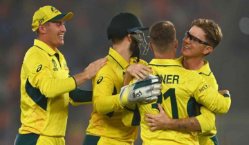 Australia knock out defending champions England by 33 runs