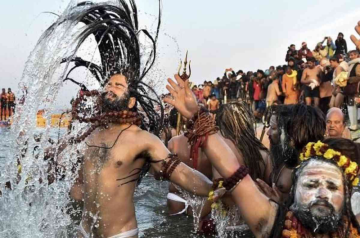 Ash-Smeared Ascetics Dive into Maha Kumbh’s Sacred Waters