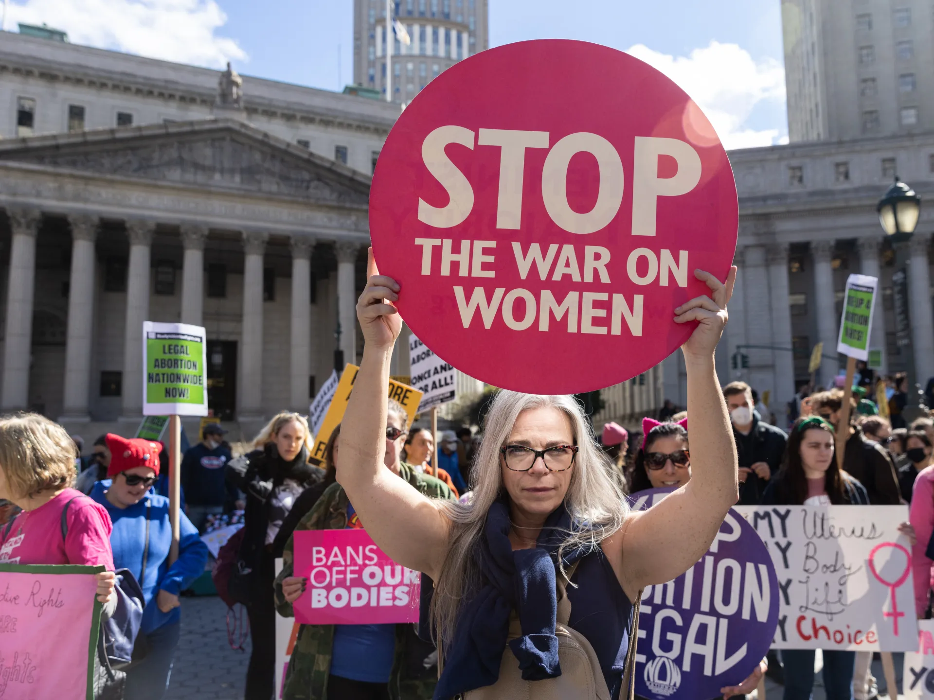 Protesters gather during a rally for women's rights in Foley Square in New York City