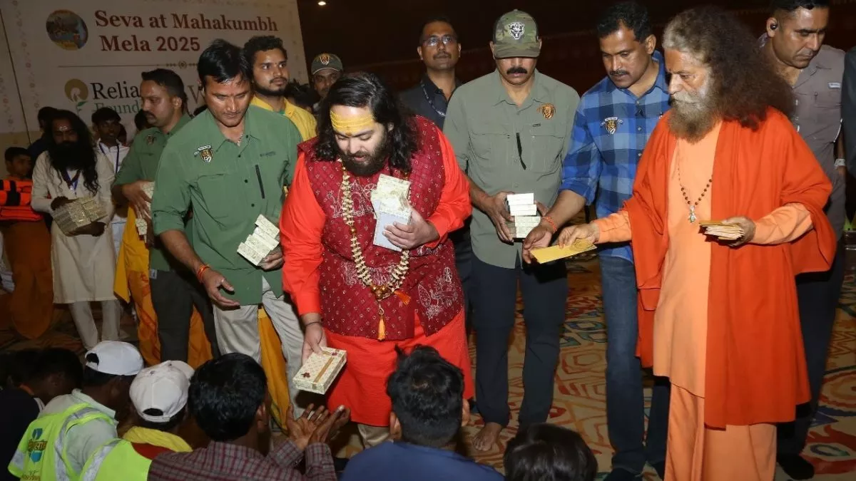 Mukesh Ambani and family take holy dip at Maha Kumbh Mela