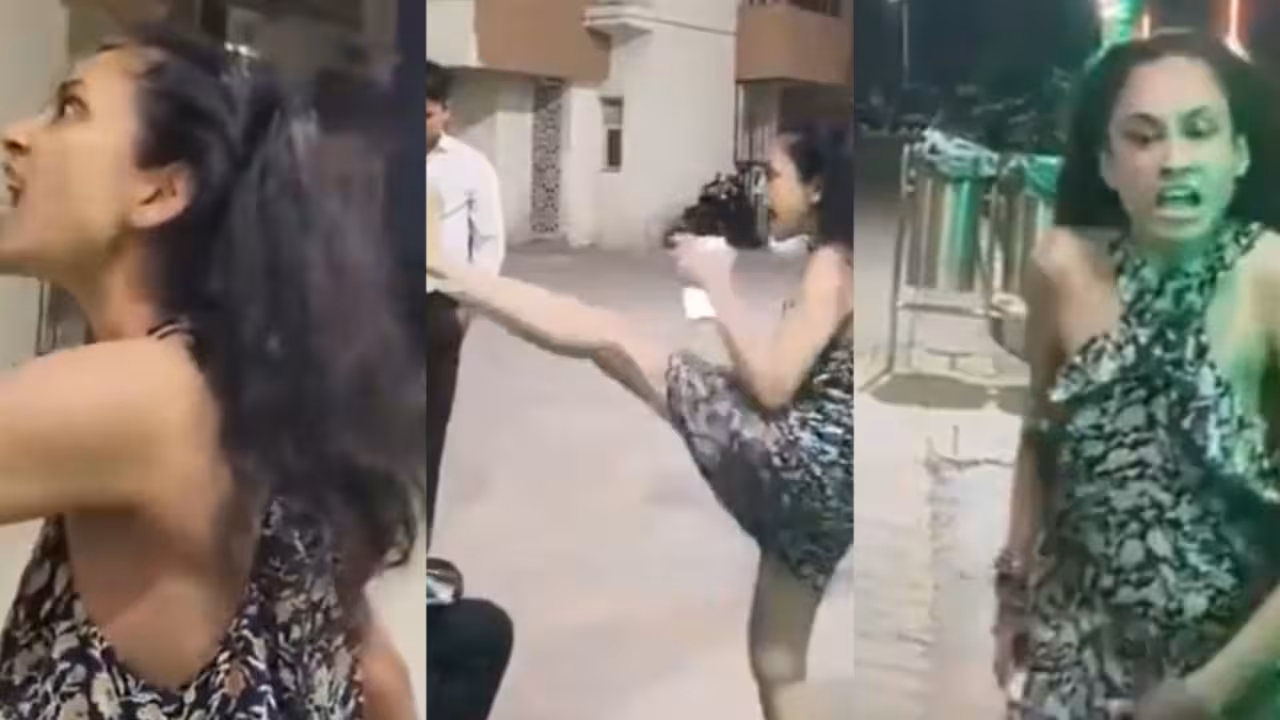 greater Noida woman abuses security guard