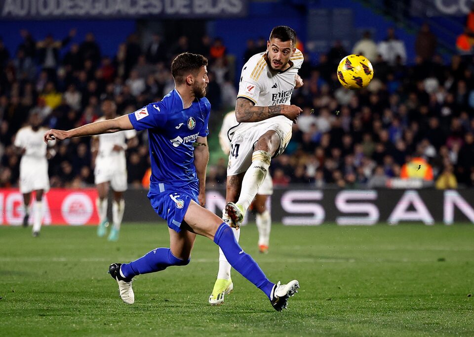 Getafe's Domingos Duarte in action with Real Madrid's Joselu.