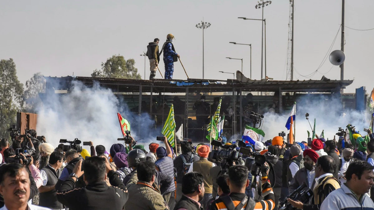 Police throwing tear gas on the farmers, during the farmer protest.