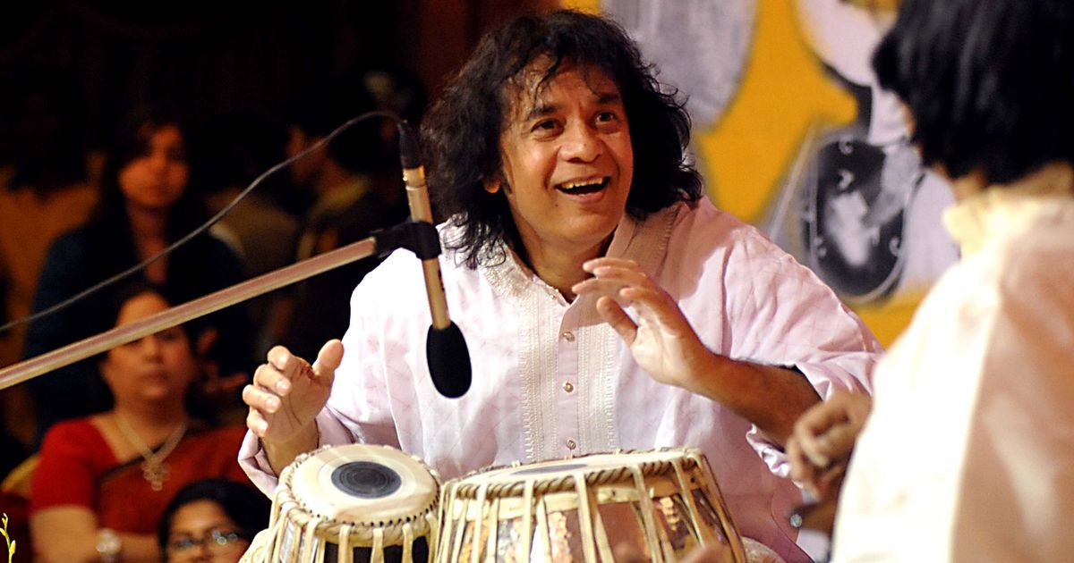 Zakir Hussain performing in a live show. 