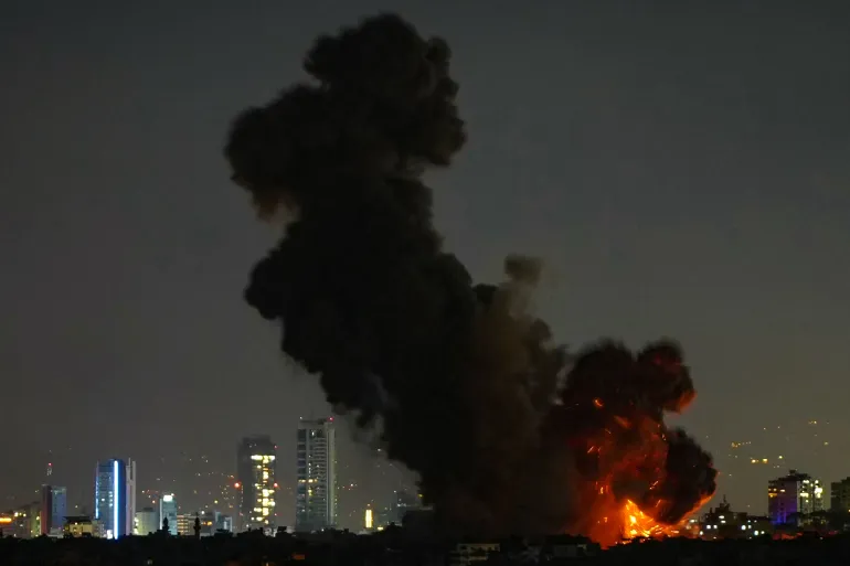 The scene at Beirut’s southern suburbs after an Israeli strike on Wednesday [Mohamed Azakir/Reuters]