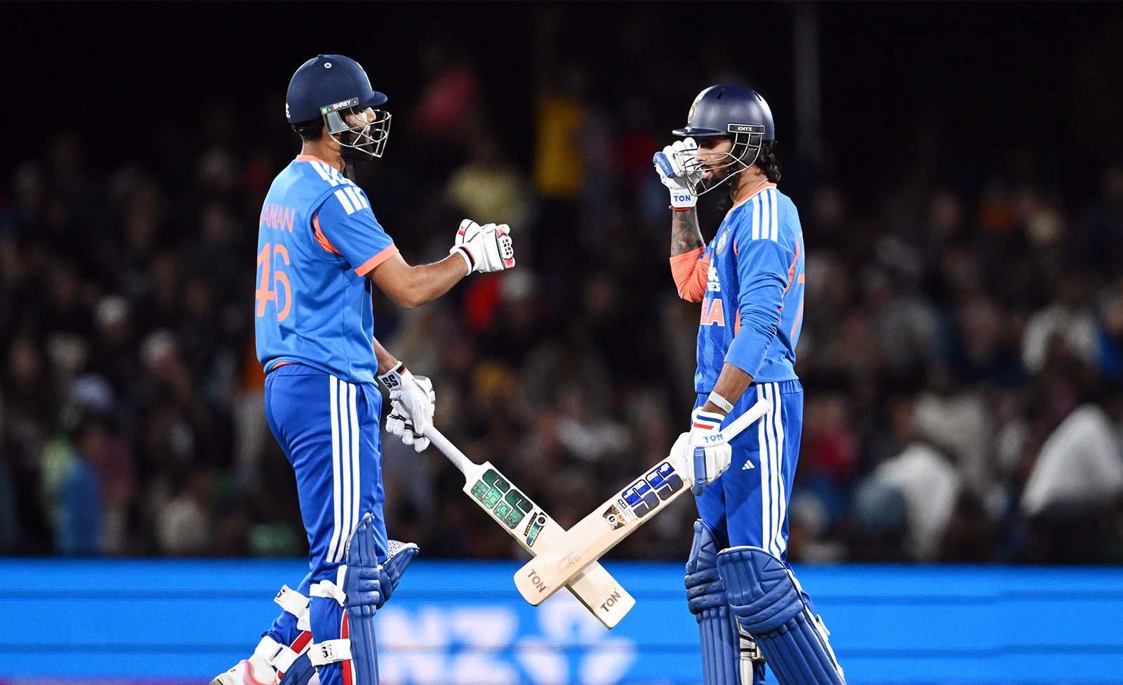Team India celebrate their historic 200th T20I victory after defeating New Zealand in a thrilling four-wicket chase led by Tilak Varma and Nitish Kumar Reddy.