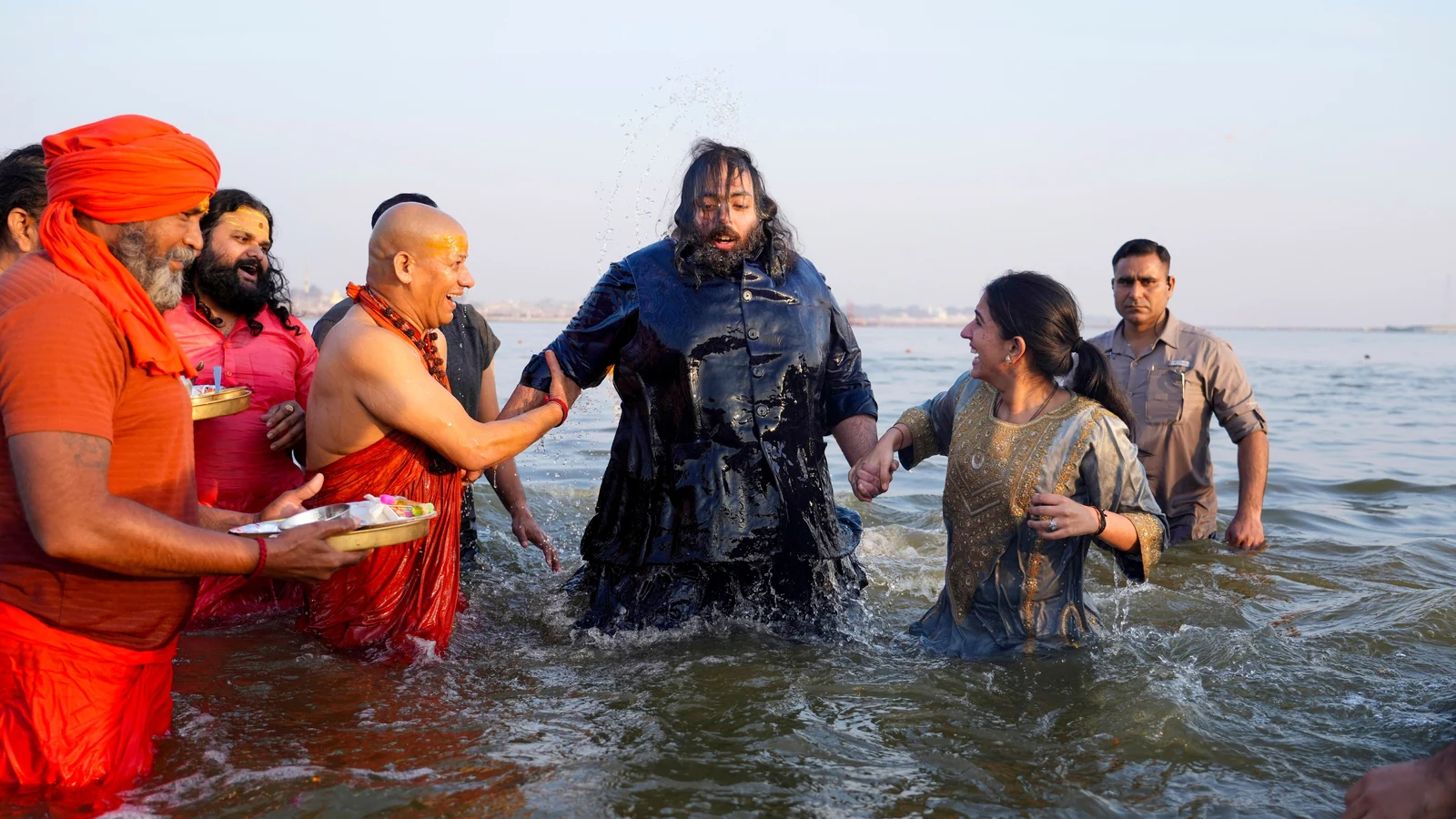 Mukesh Ambani and family take holy dip at Maha Kumbh Mela