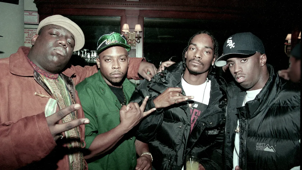 photo: From left to right, American rappers Notorious B.I.G., Nate Dogg, Snoop Dogg, and Sean Combs