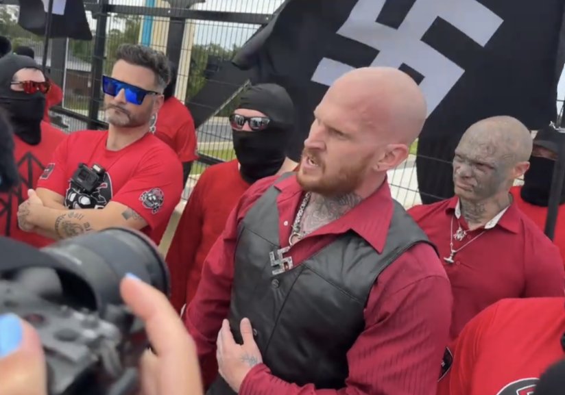 White supremacists march in Florida with Swastika flags and Hitler Salutes