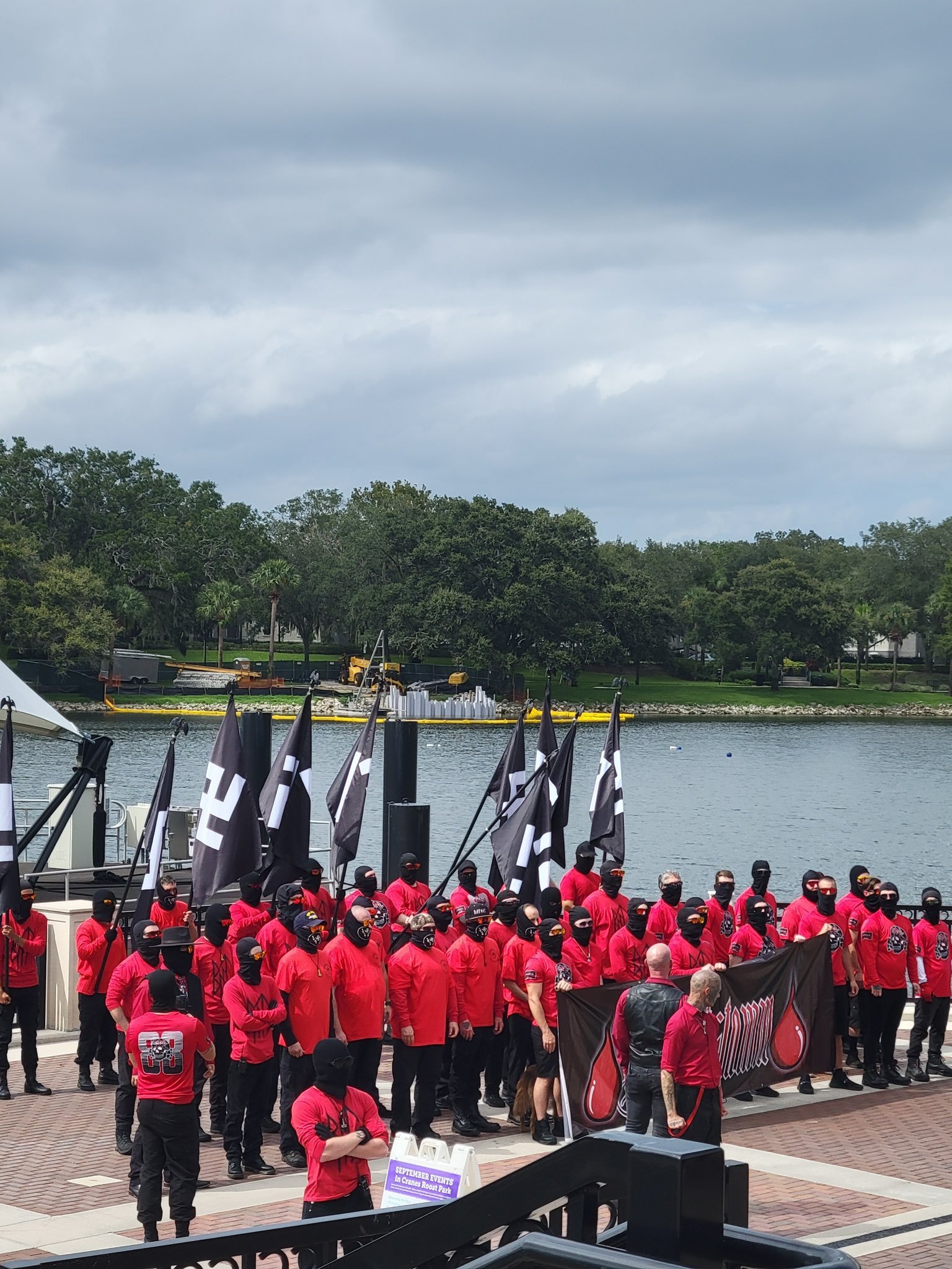 White supremacists march in Florida with Swastika flags and Hitler Salutes