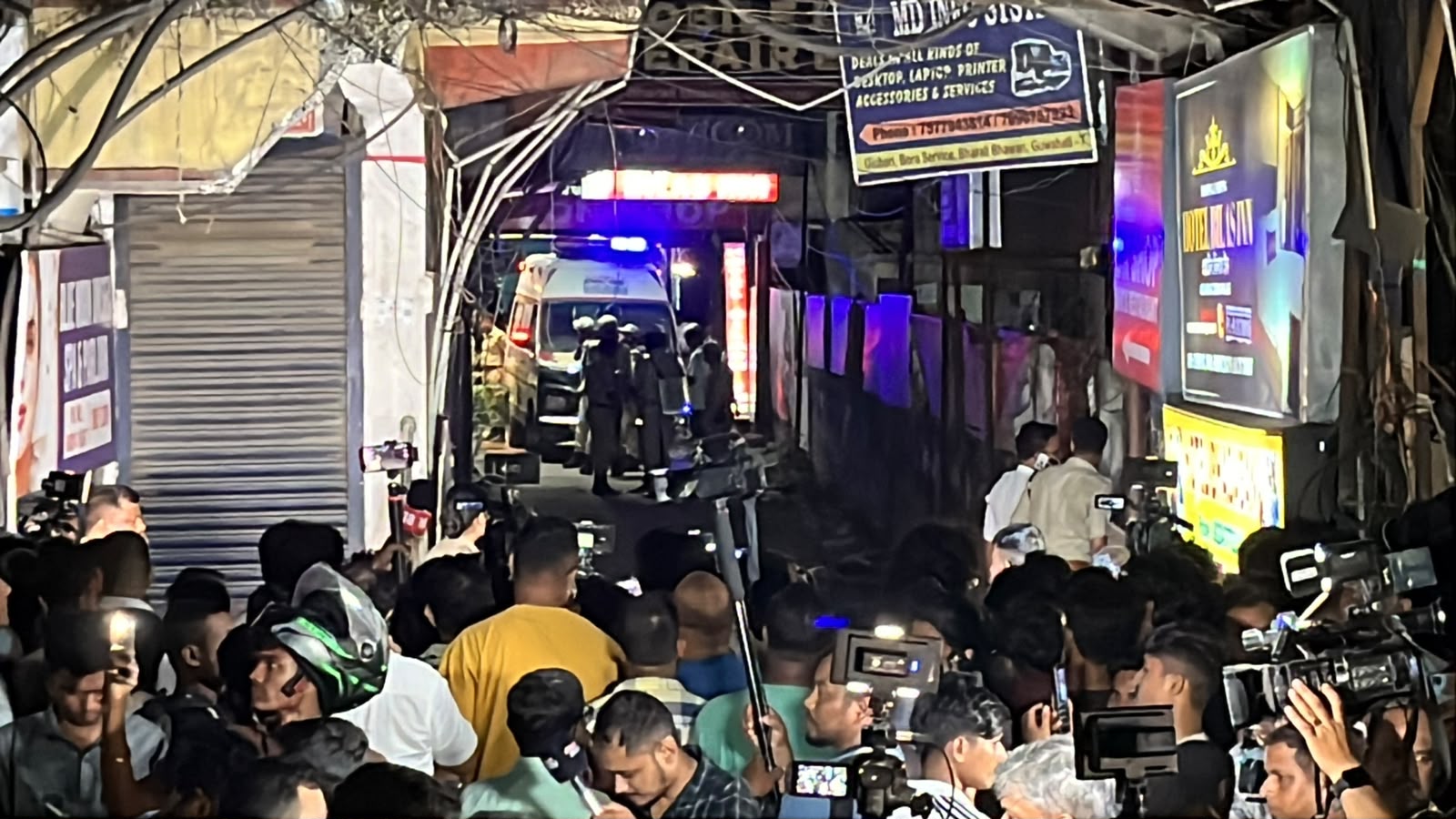 Police investigate the deadly shooting at Hotel Bilas Inn in Guwahati, Assam, where four people were killed.