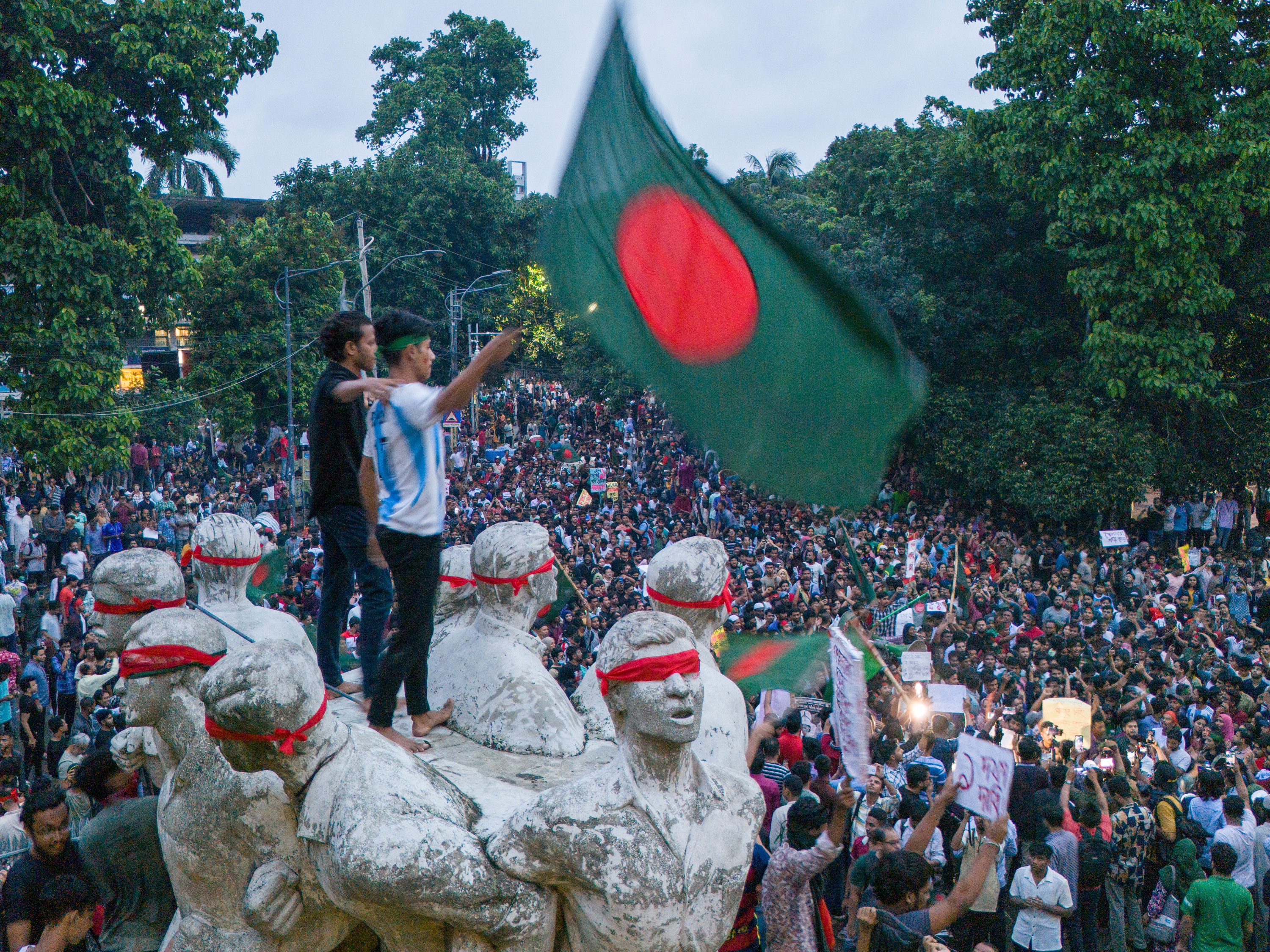 Breaking News: Violent Clashes Erupt in Bangladesh, Nearly 100 Dead and Hundreds Injured  Dhaka, Bangladesh - Nearly 100 people, including 14 policemen, have been killed and hundreds more injured in fierce clashes between protesters and ruling party supporters across Bangladesh. The violence has led authorities to cut off mobile internet services and impose an indefinite nationwide curfew.