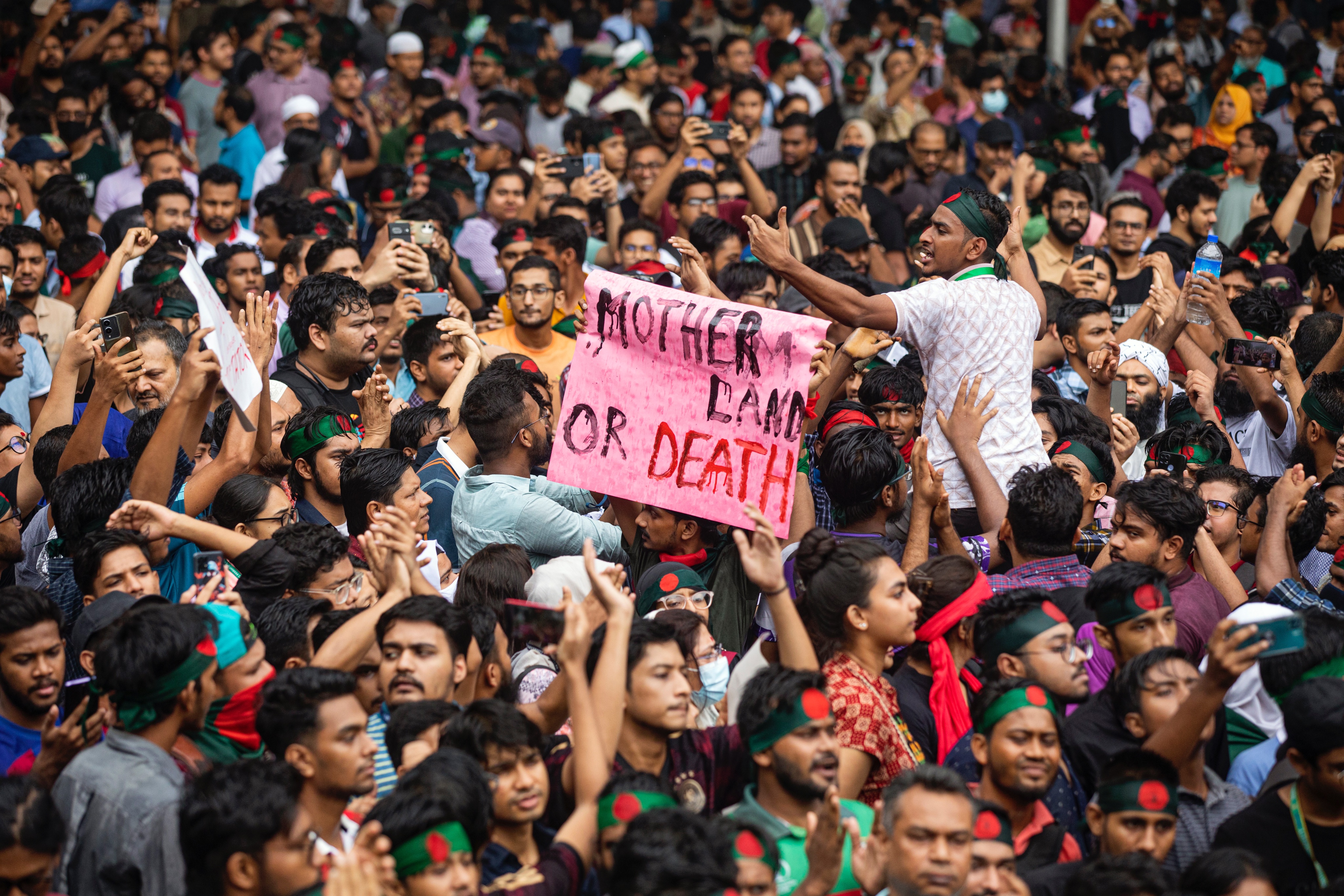 Breaking News: Violent Clashes Erupt in Bangladesh, Nearly 100 Dead and Hundreds Injured  Dhaka, Bangladesh - Nearly 100 people, including 14 policemen, have been killed and hundreds more injured in fierce clashes between protesters and ruling party supporters across Bangladesh. The violence has led authorities to cut off mobile internet services and impose an indefinite nationwide curfew.