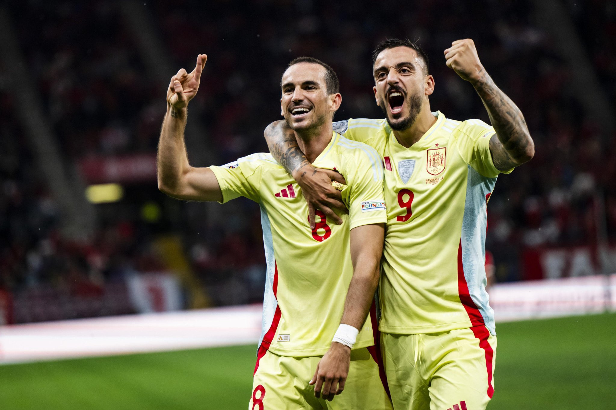 Soccer Football - Nations League - League A - Group 4 - Switzerland v Spain - Stade de Geneve, Geneva, Switzerland - September 8, 2024 Spain's Fabian Ruiz celebrates scoring their third goal with Yeremy Pino