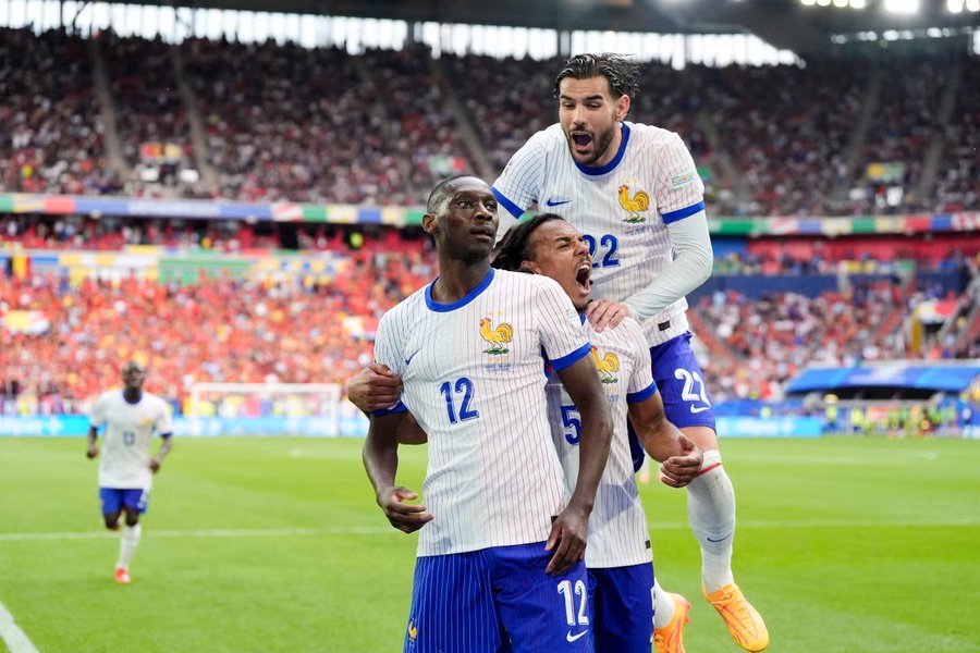 France’s Randal Kolo Muani celebrates after scoring his side’s second goal during the UEFA Nations League, group match against Belgium