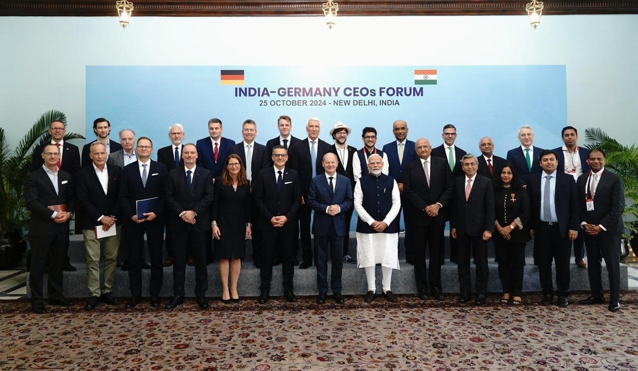 German Chancellor Olaf Scholz shakes hands with Prime Minister of India Narendra Modi on October 25,