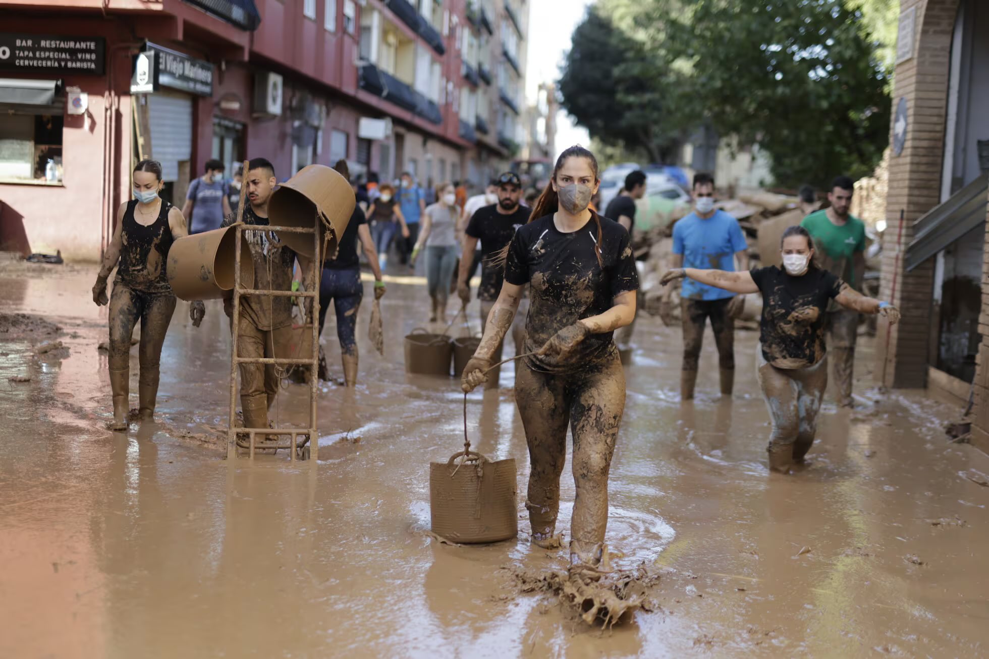 Rescue teams search for missing people in a flooded residential car park in Picanya municipality, Valencia following the storm