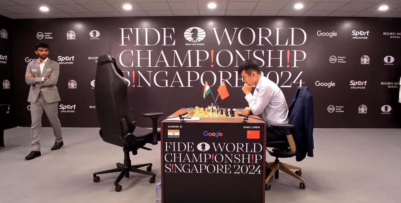 D Gukesh vs Ding Liren playing chess.