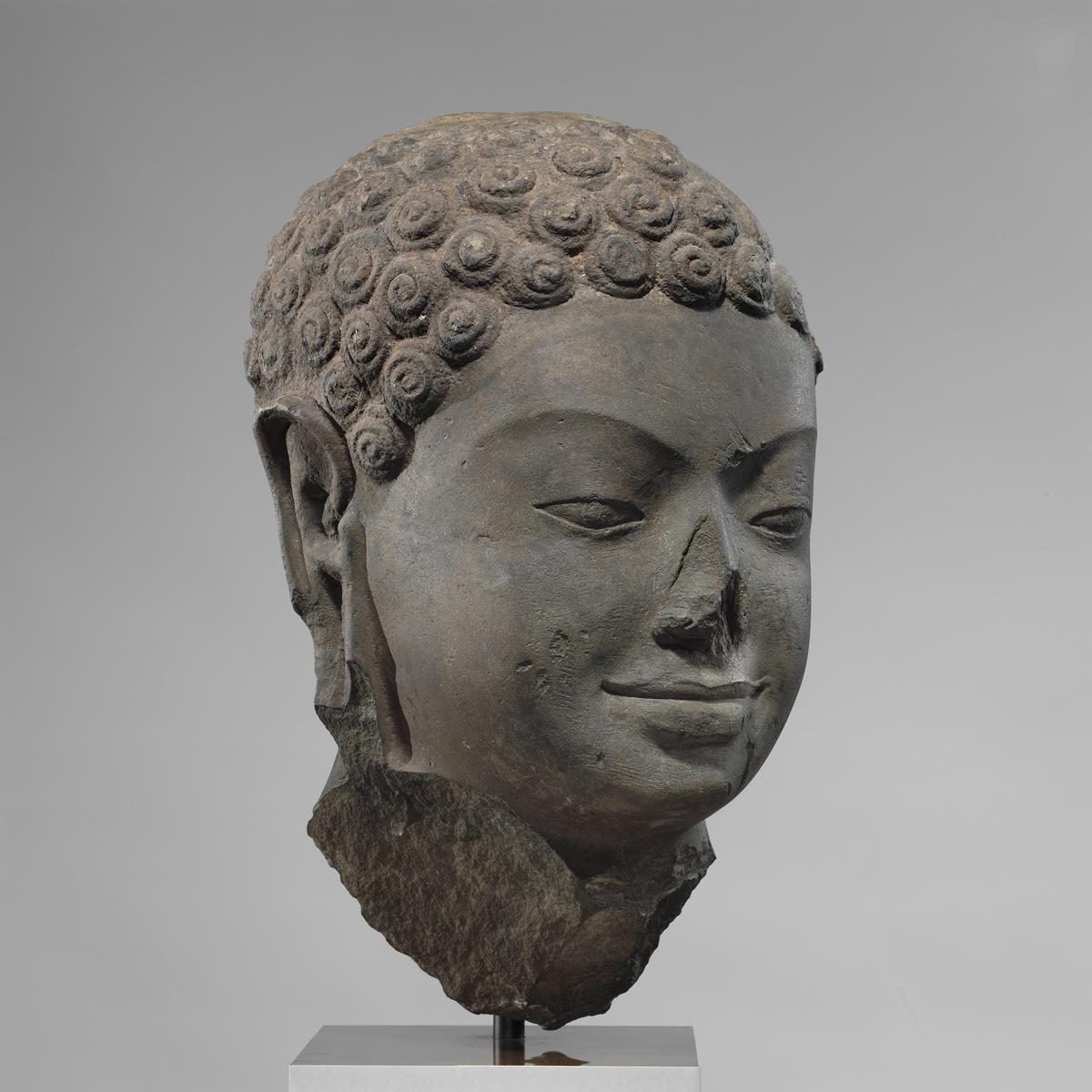 "Head of Buddha," a seventh-century stone art piece. 