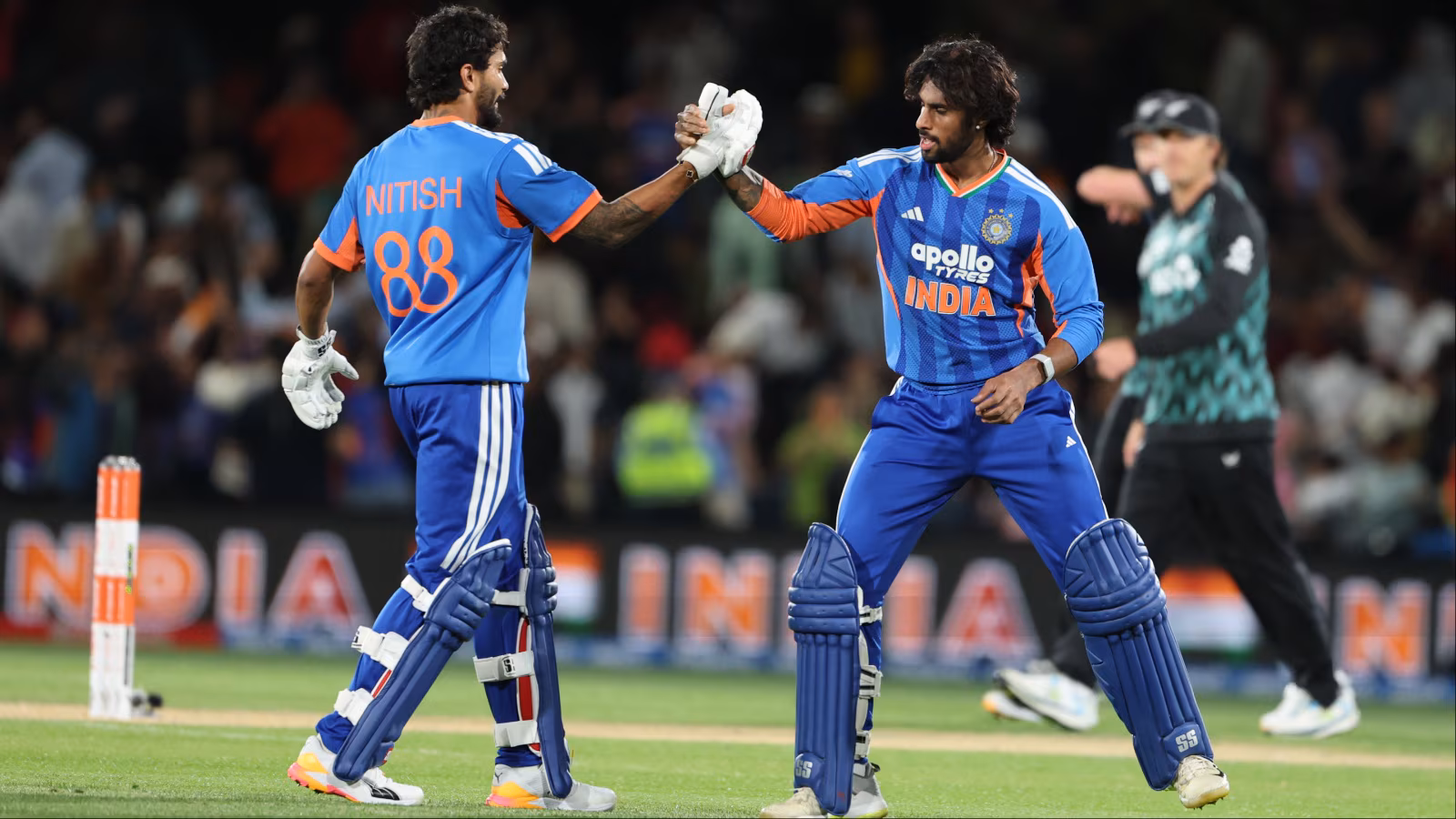 Team India celebrate their historic 200th T20I victory after defeating New Zealand in a thrilling four-wicket chase led by Tilak Varma and Nitish Kumar Reddy.