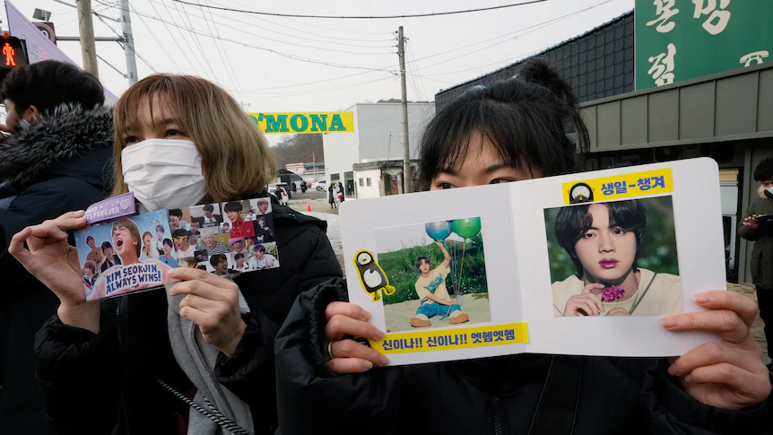 fans bidding farewell to Jin