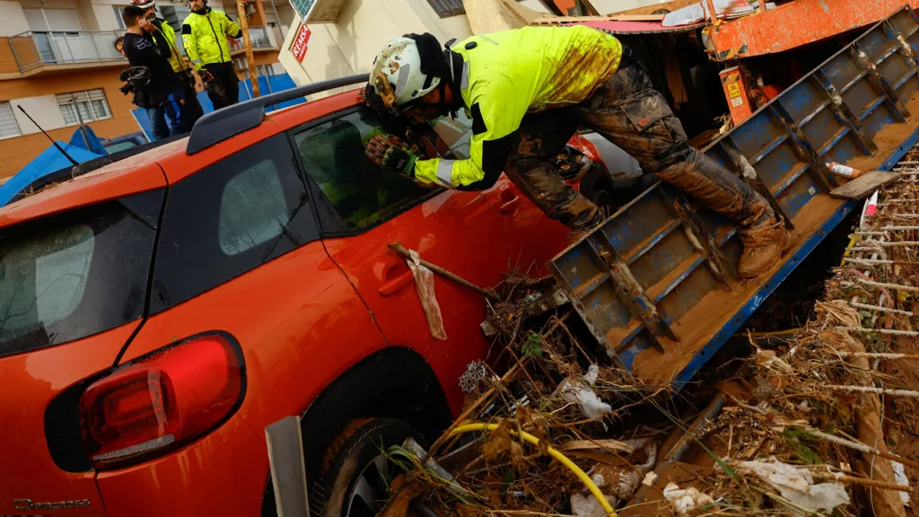 It is feared that more people will be found dead in their cars, after some motorists were trapped by the floodwaters