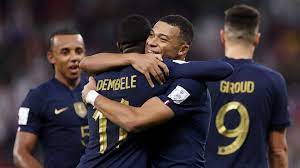 Mbappe leads France to next round.