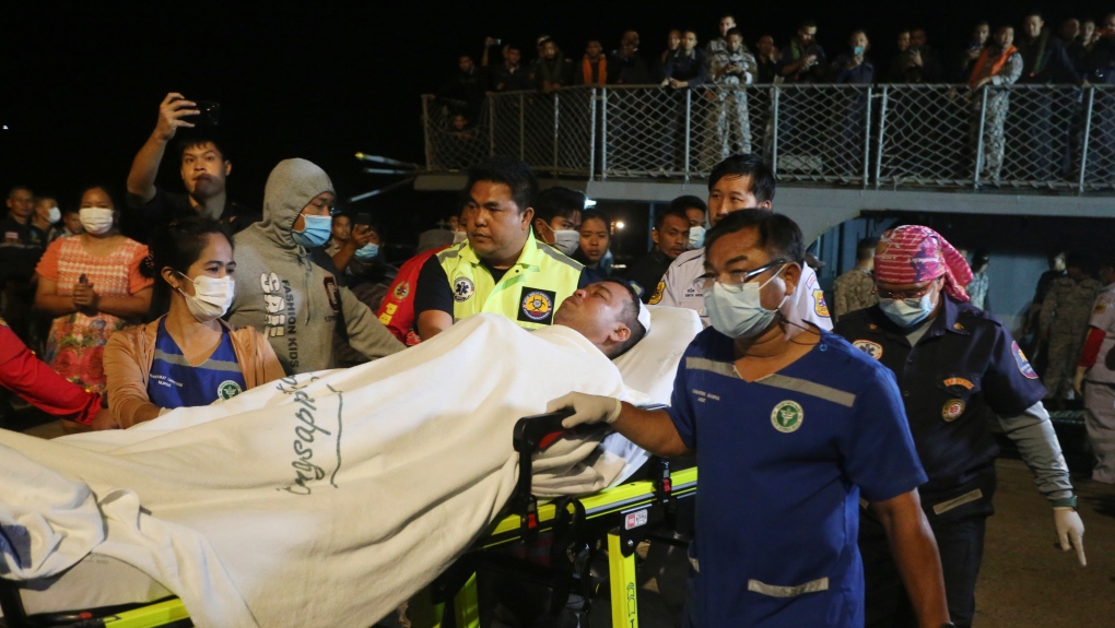 edical professionals at the dock carrying members of the crew off on stretchers are circulated in the local media.(AP Photo/Anuthep Cheysakron)