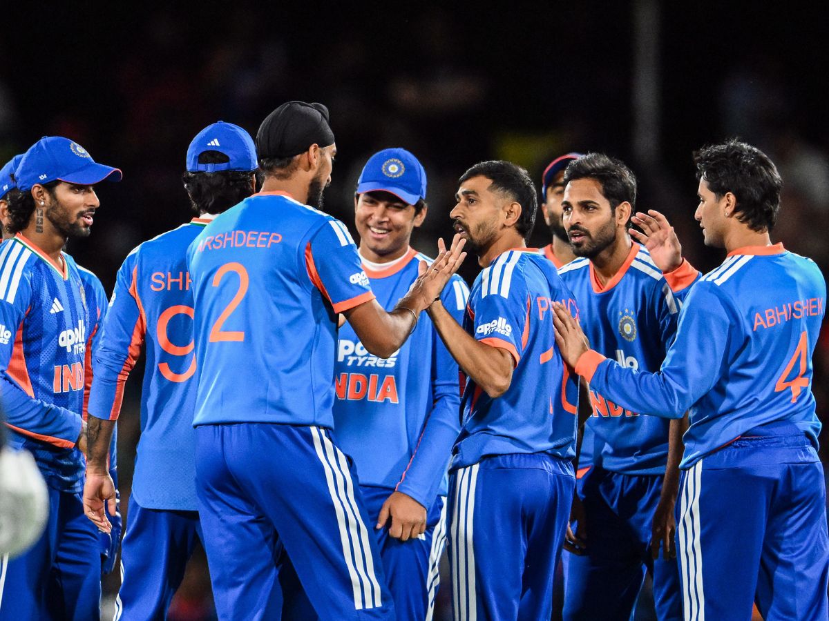 Team India celebrate their historic 200th T20I victory after defeating New Zealand in a thrilling four-wicket chase led by Tilak Varma and Nitish Kumar Reddy.