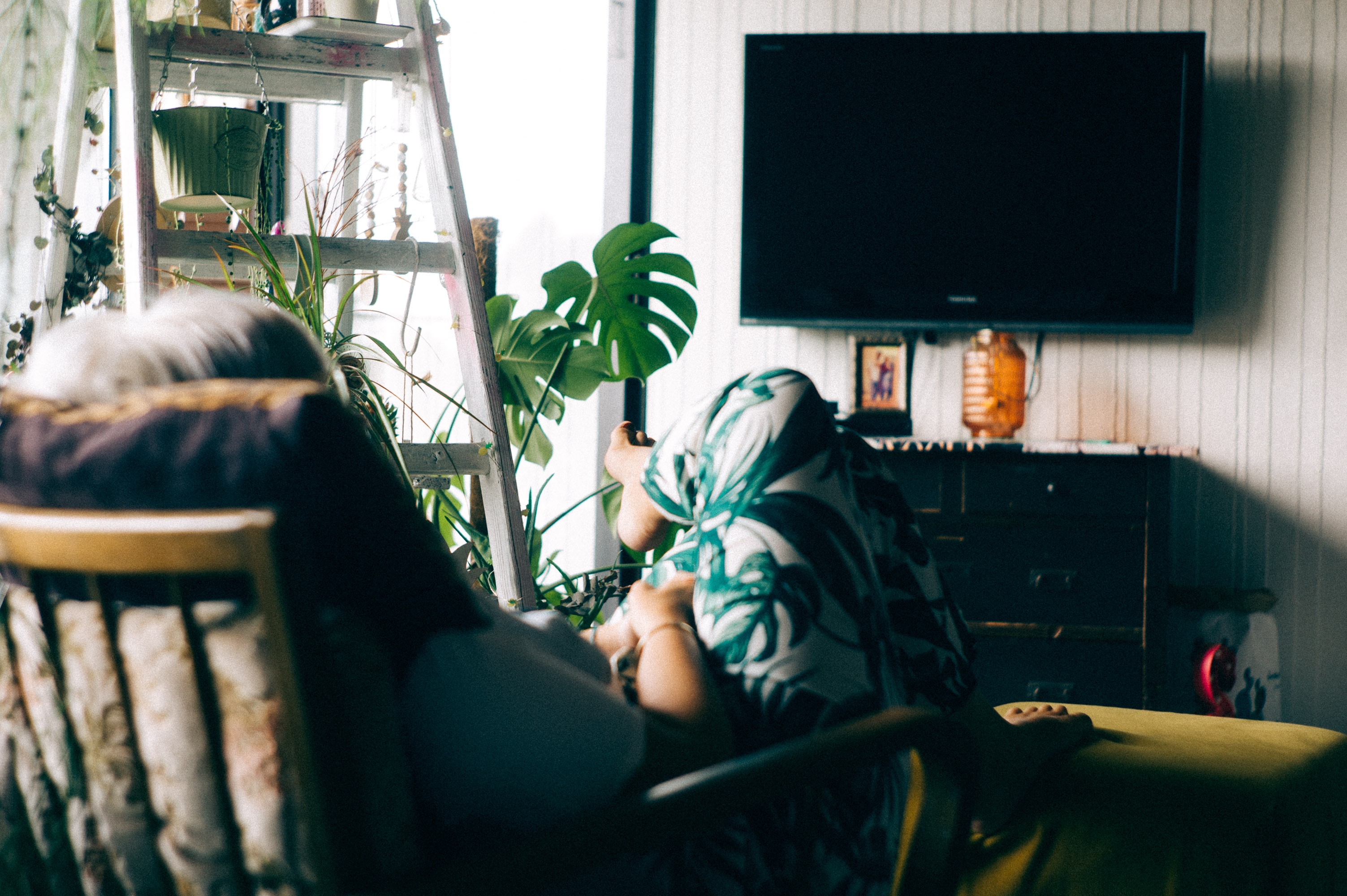 Photo: A man watching  Tv