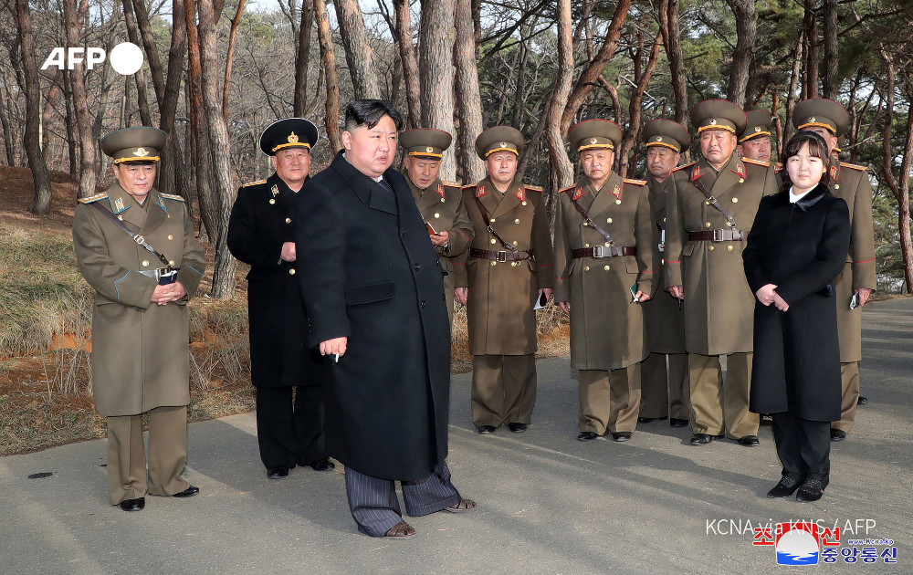 Kim Jong Un with daughter