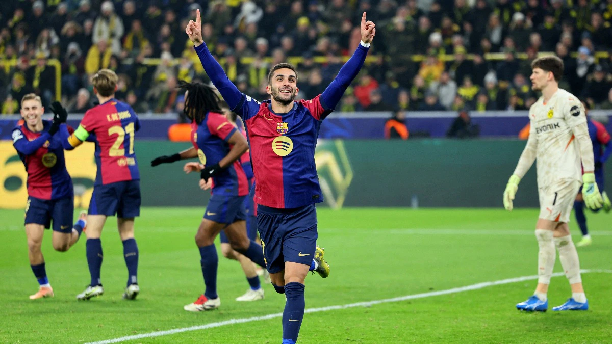 Ferran Torres celebrating after scoring a goal.