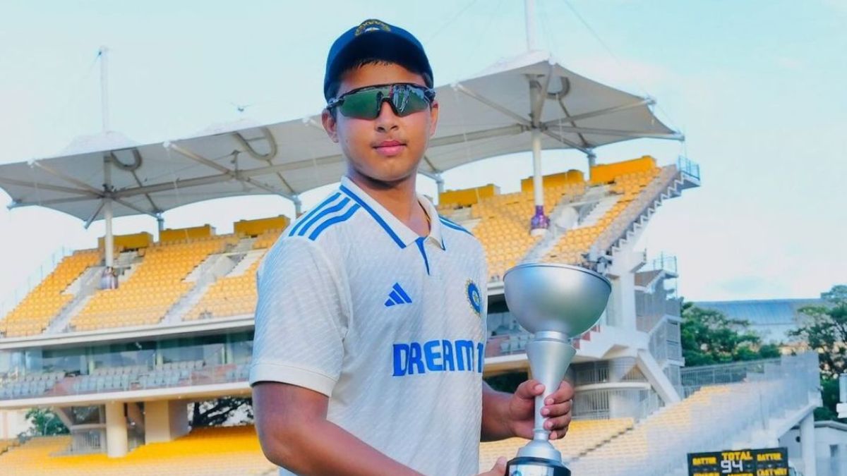 Vaibhav Suryavanshi with Ranji Trophy holding in his hands.